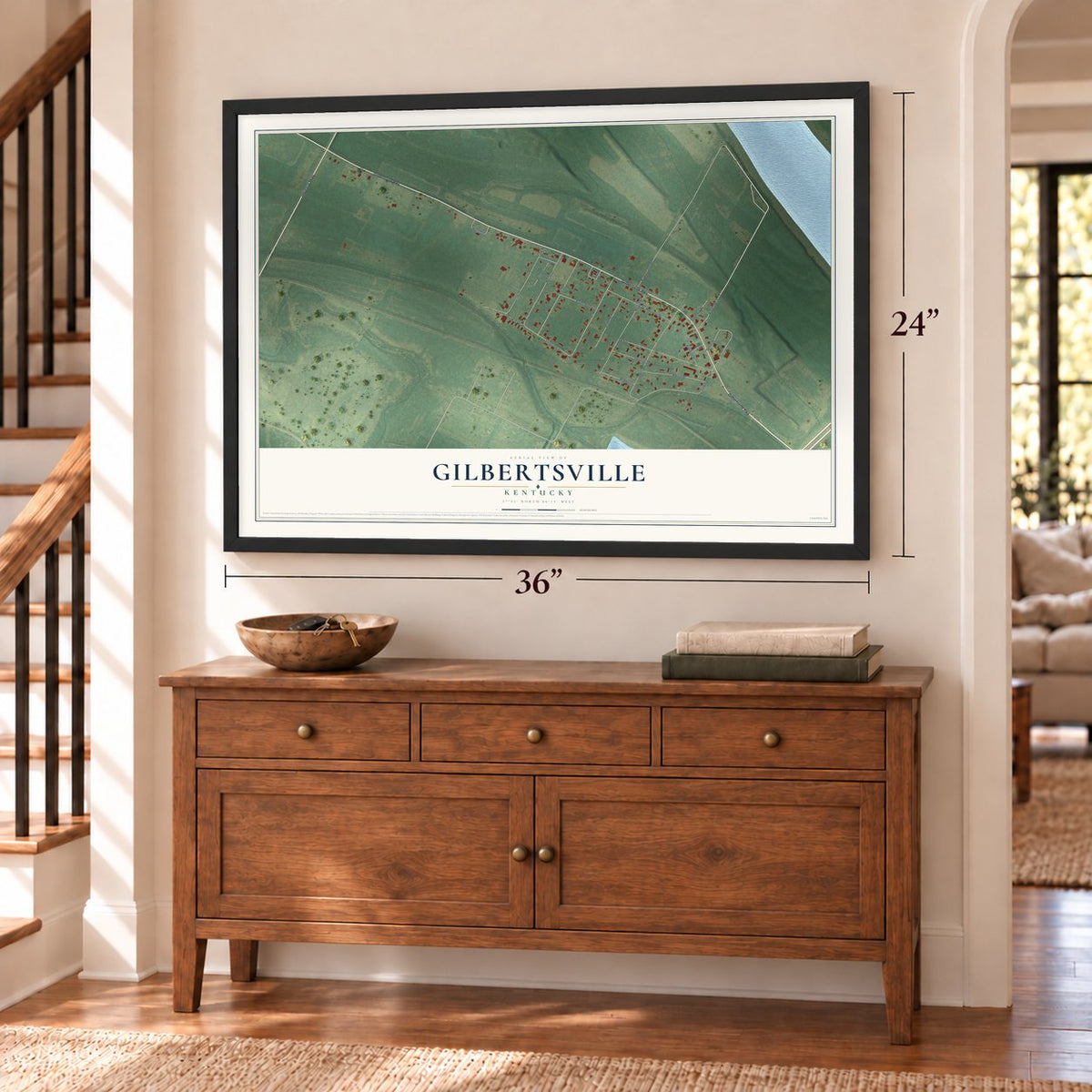 Gilbertsville, Kentucky map, 24 x 36 inch print in a black frame above a dresser by a staircase