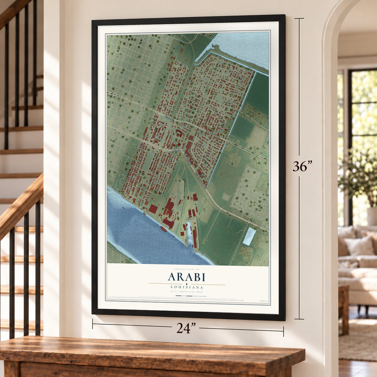 Arabi, Louisiana map, 24 x 36 inch print in a black frame by a staircase