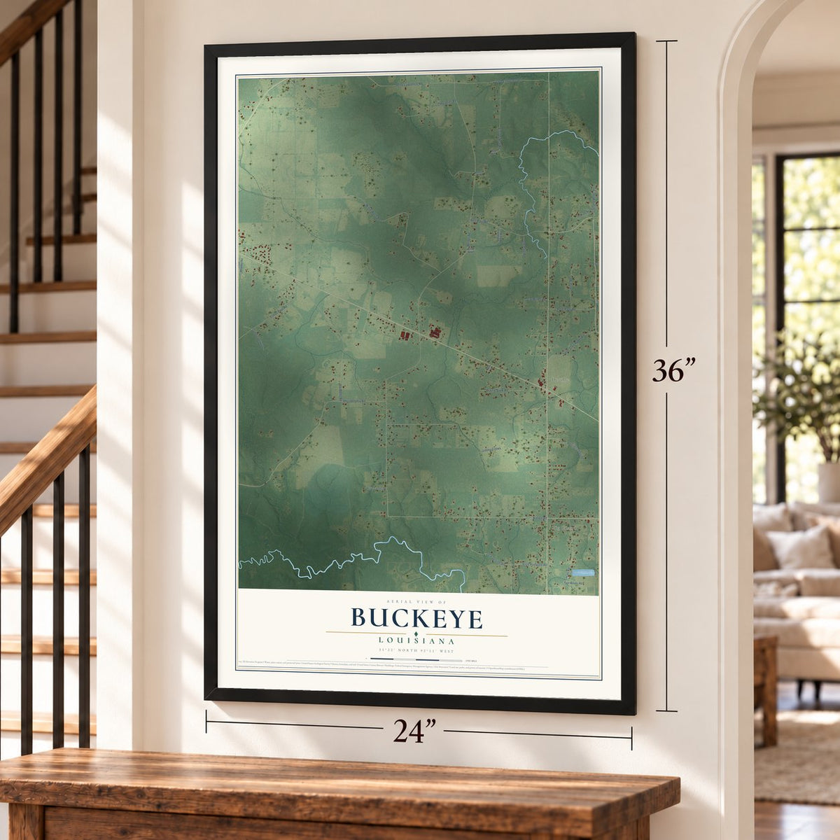 Buckeye, Louisiana map, 24 x 36 inch print in a black frame by a staircase