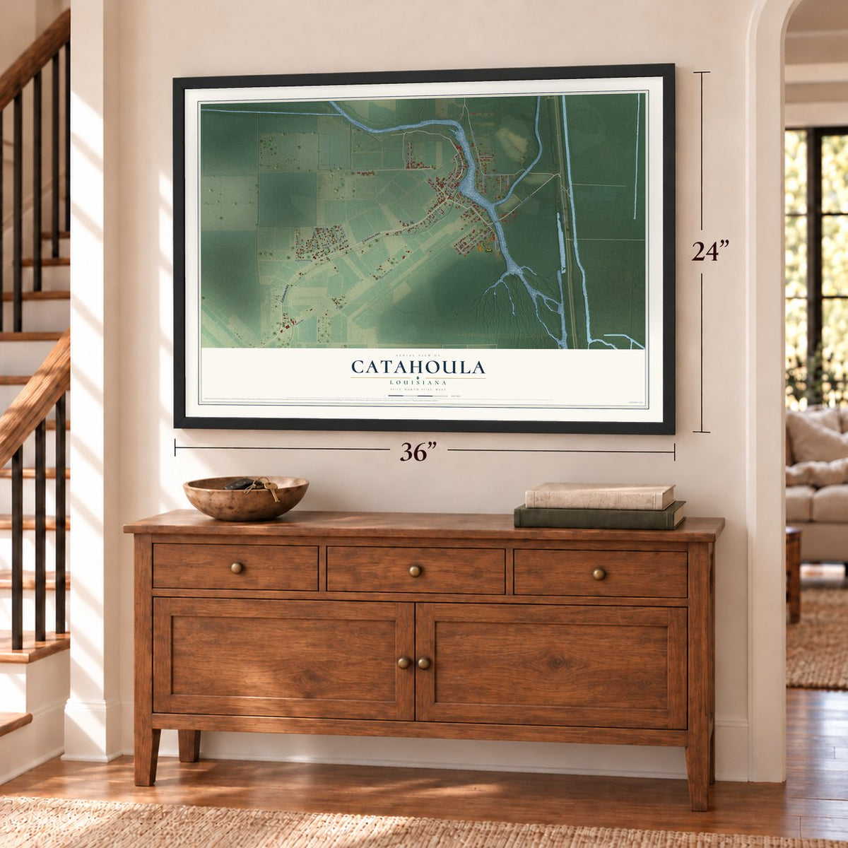 Catahoula, Louisiana map, 24 x 36 inch print in a black frame above a dresser by a staircase
