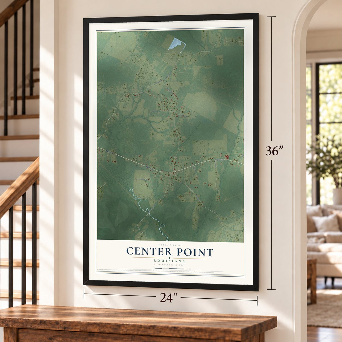 Center Point, Louisiana map, 24 x 36 inch print in a black frame by a staircase