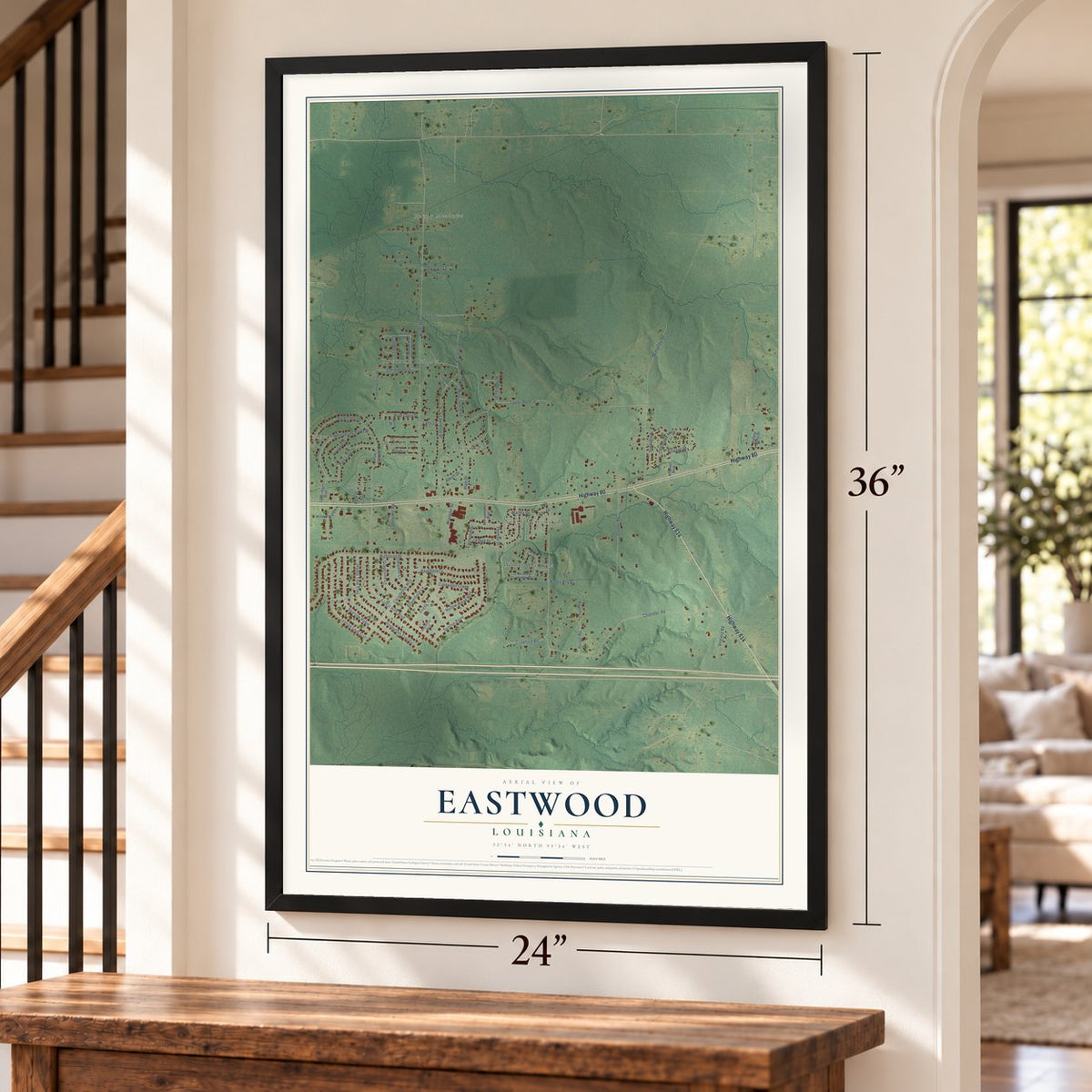Eastwood, Louisiana map, 24 x 36 inch print in a black frame by a staircase