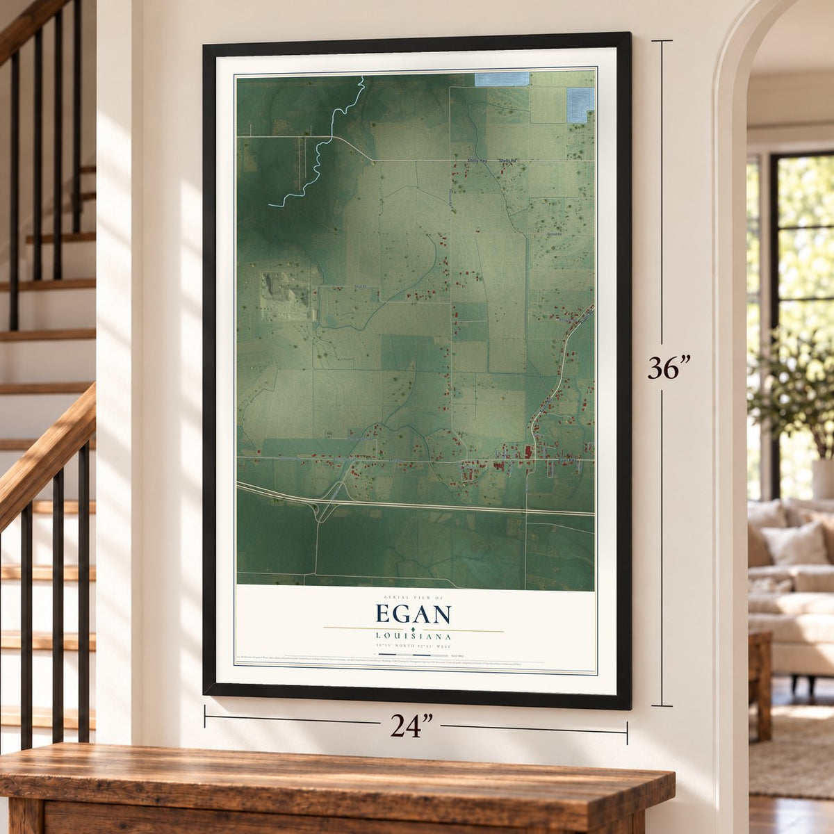 Egan, Louisiana map, 24 x 36 inch print in a black frame by a staircase