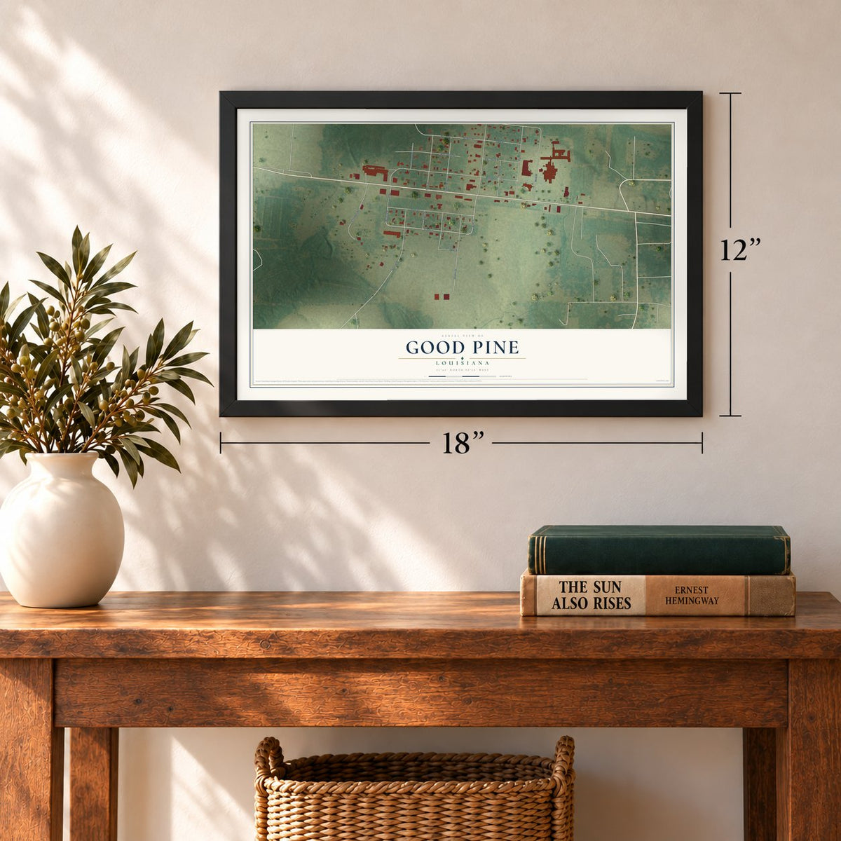Good Pine, Louisiana map, 12 x 18 inch print in a black frame in an entryway