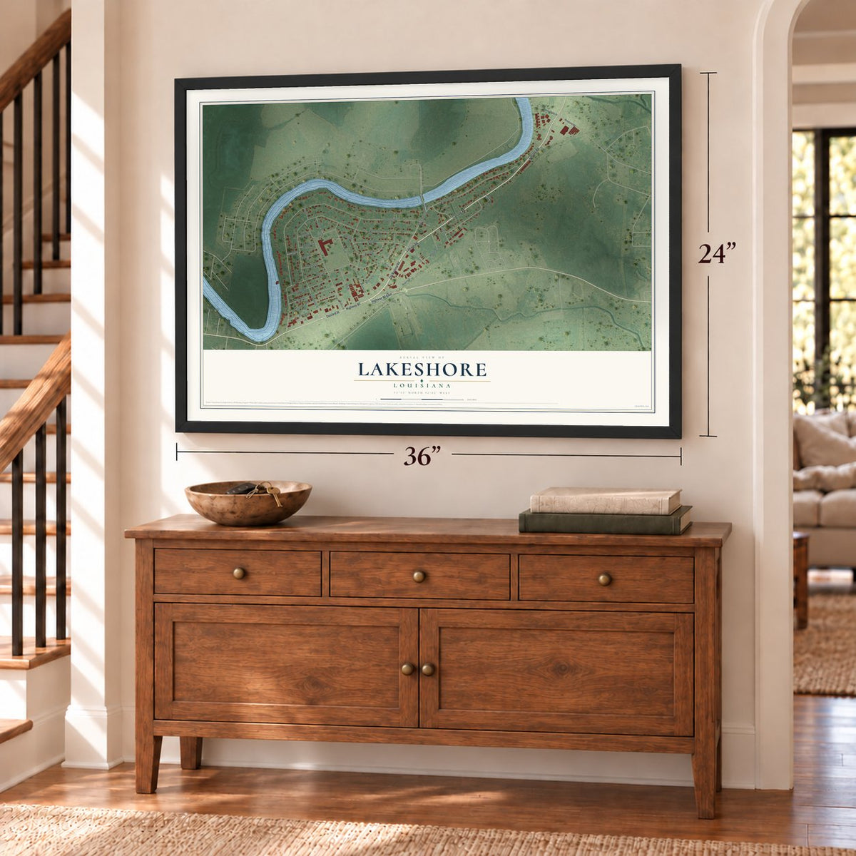 Lakeshore, Louisiana map, 24 x 36 inch print in a black frame above a dresser by a staircase