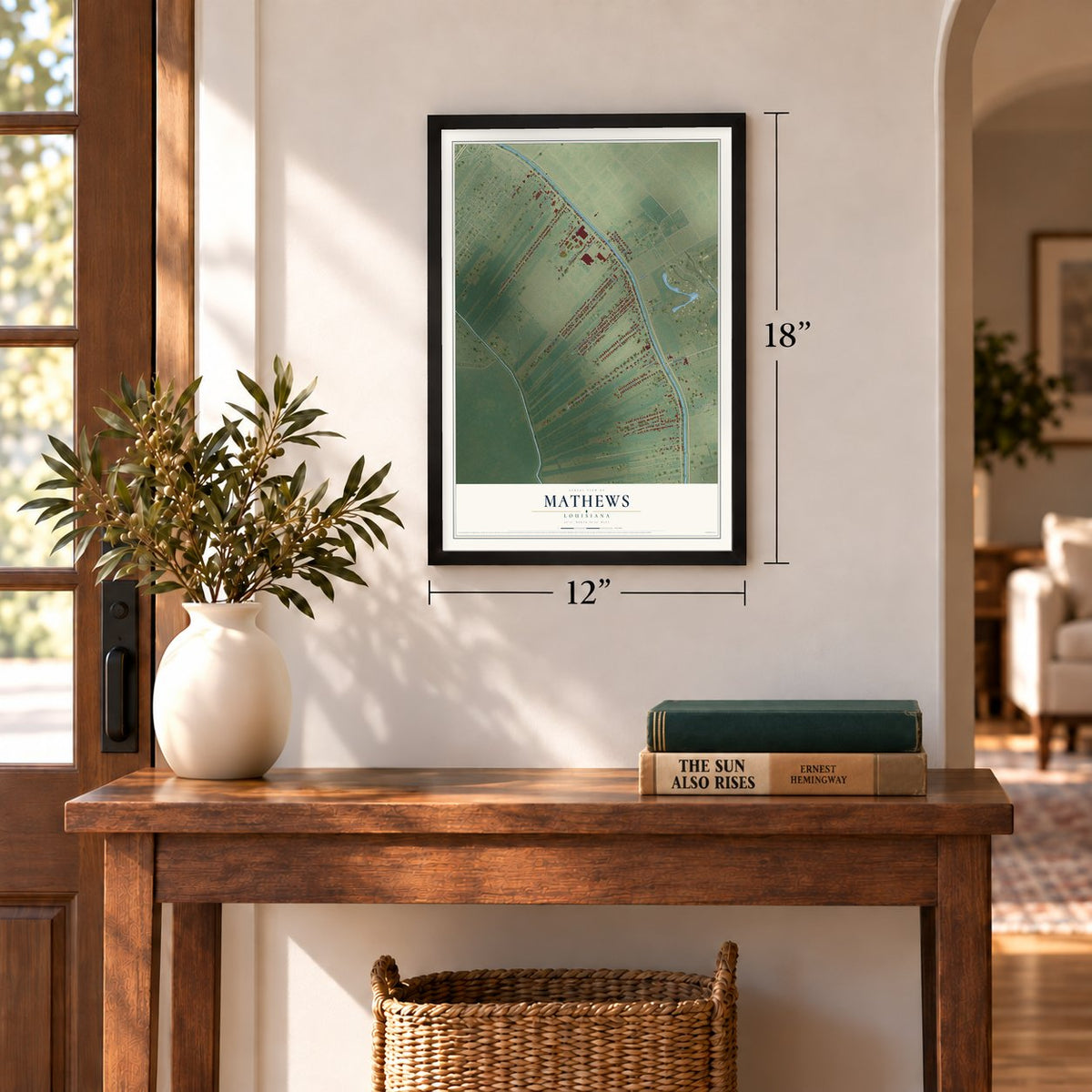 Mathews, Louisiana map, 12 x 18 inch print in a black frame in an entryway
