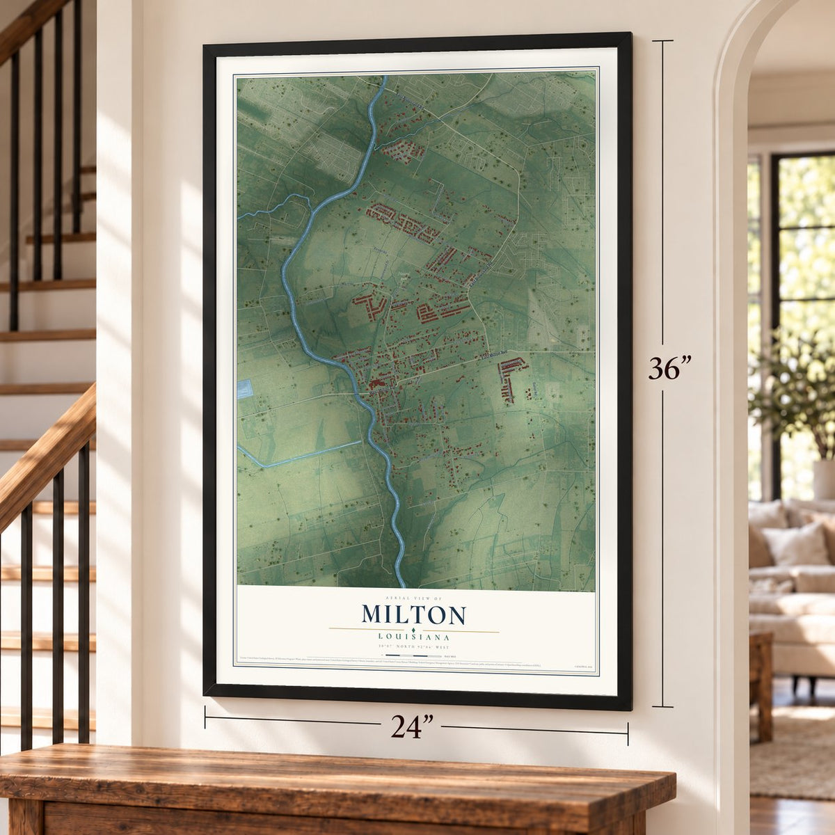 Milton, Louisiana map, 24 x 36 inch print in a black frame by a staircase