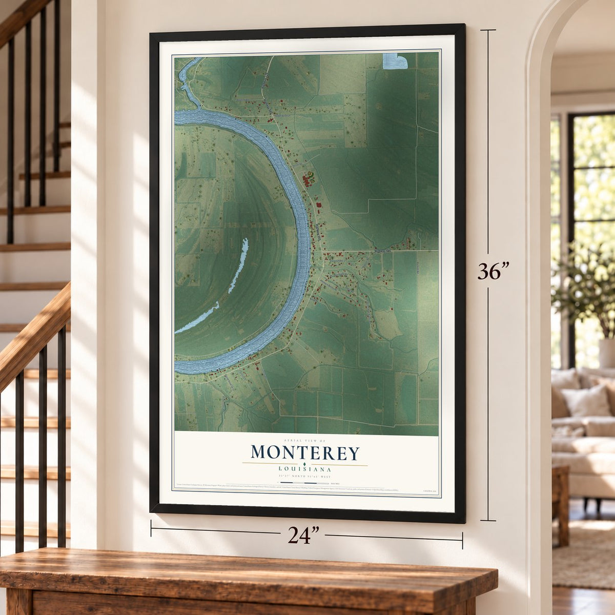 Monterey, Louisiana map, 24 x 36 inch print in a black frame by a staircase