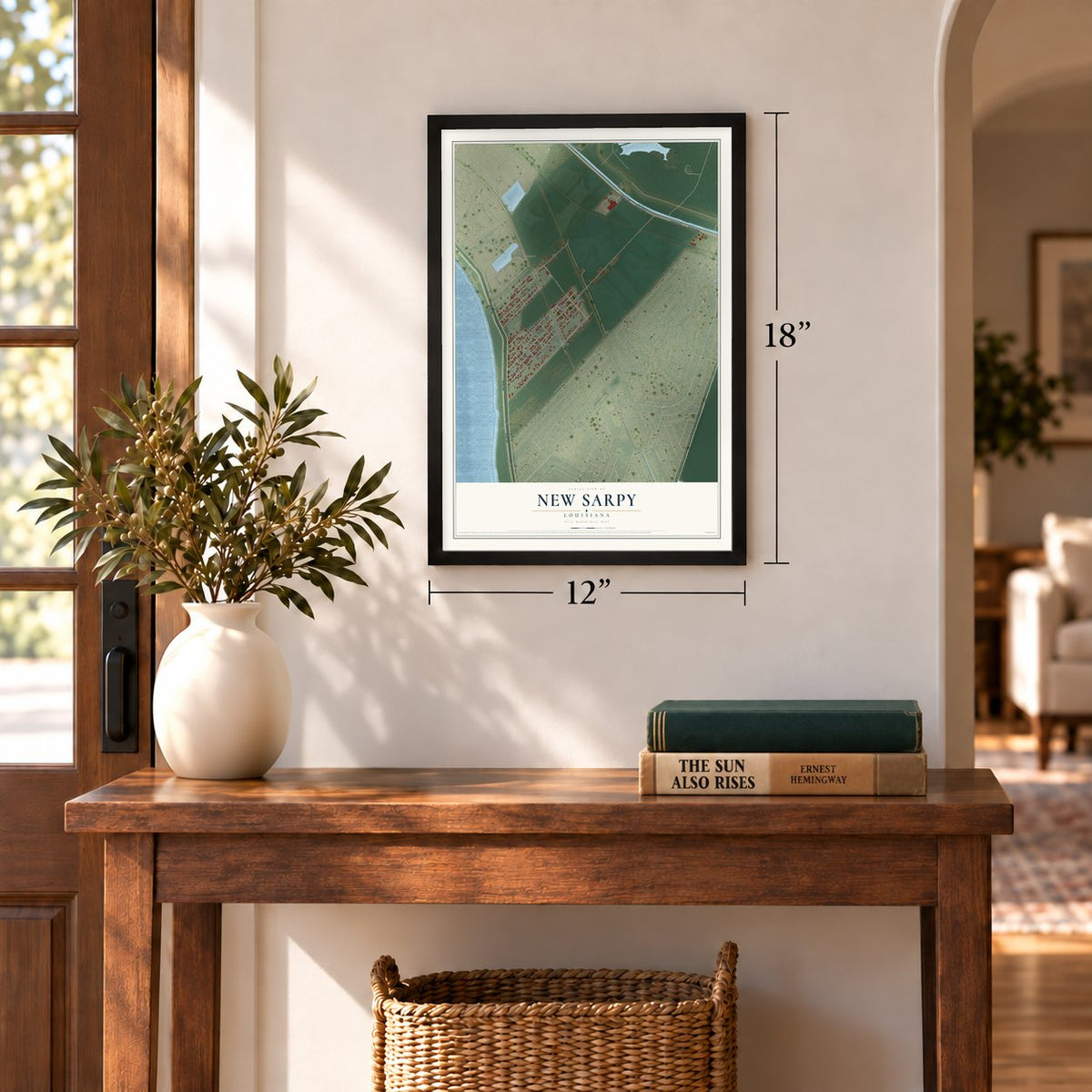 New Sarpy, Louisiana map, 12 x 18 inch print in a black frame in an entryway