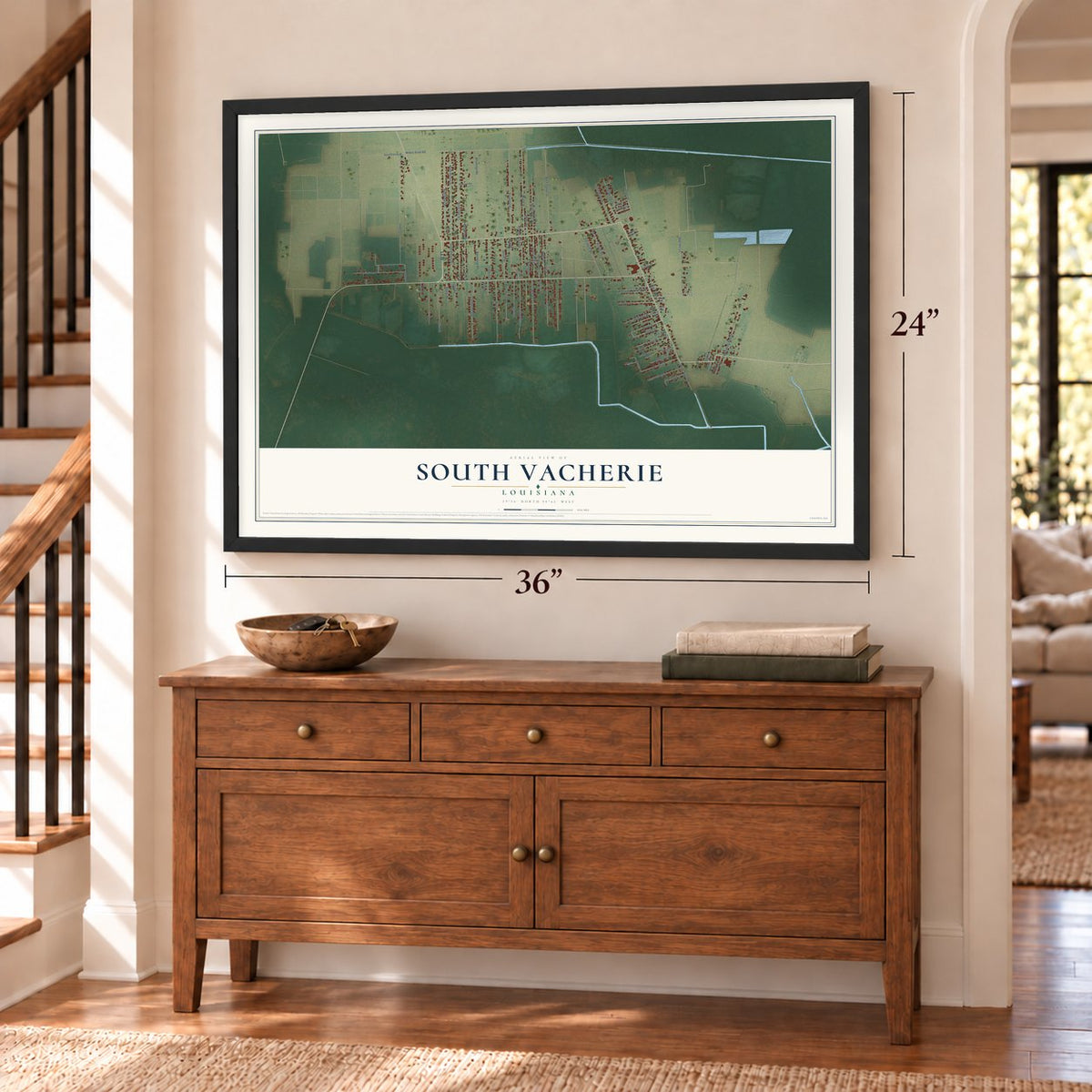 South Vacherie, Louisiana map, 24 x 36 inch print in a black frame above a dresser by a staircase