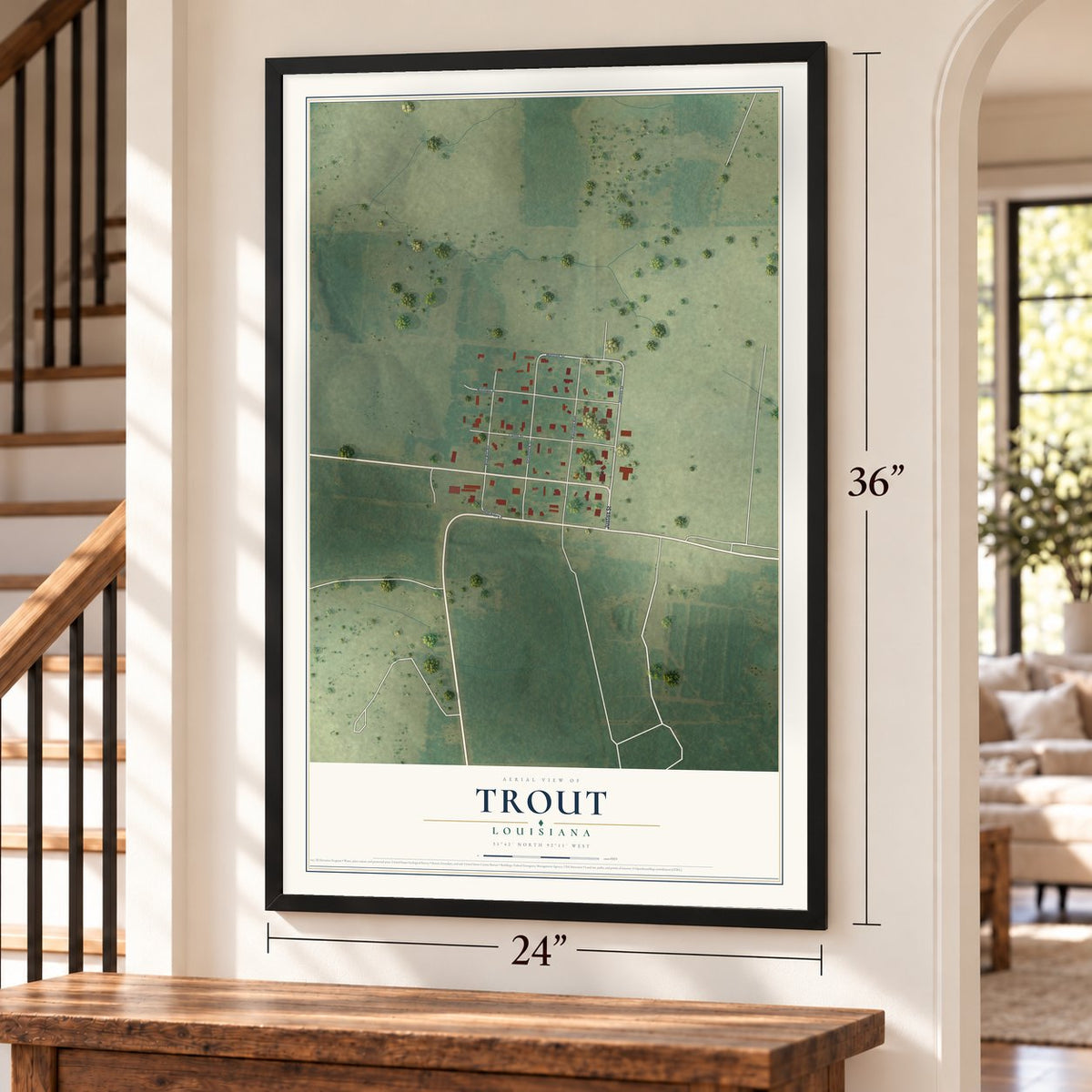 Trout, Louisiana map, 24 x 36 inch print in a black frame by a staircase