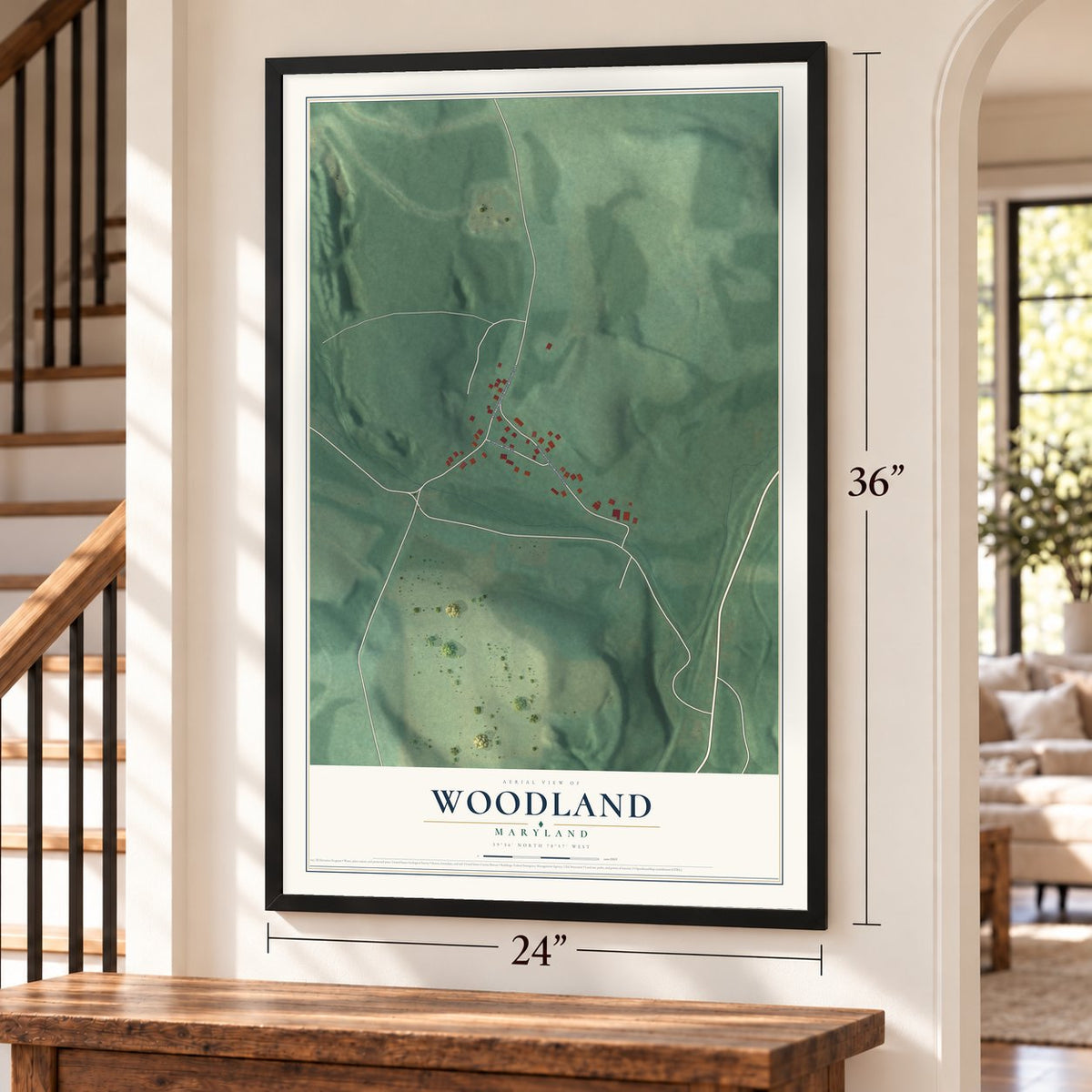 Woodland, Maryland map, 24 x 36 inch print in a black frame by a staircase