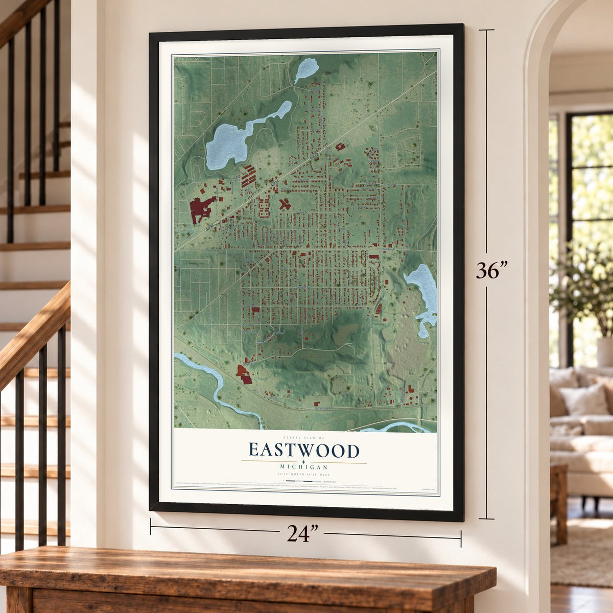 Eastwood, Michigan map, 24 x 36 inch print in a black frame by a staircase