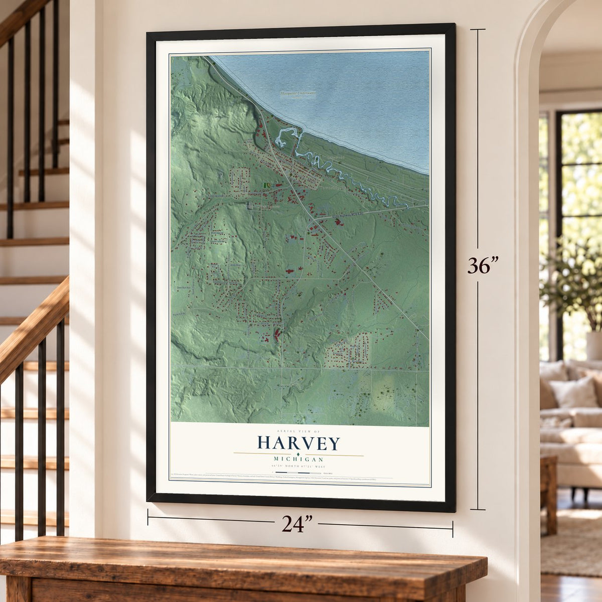 Harvey, Michigan map, 24 x 36 inch print in a black frame by a staircase