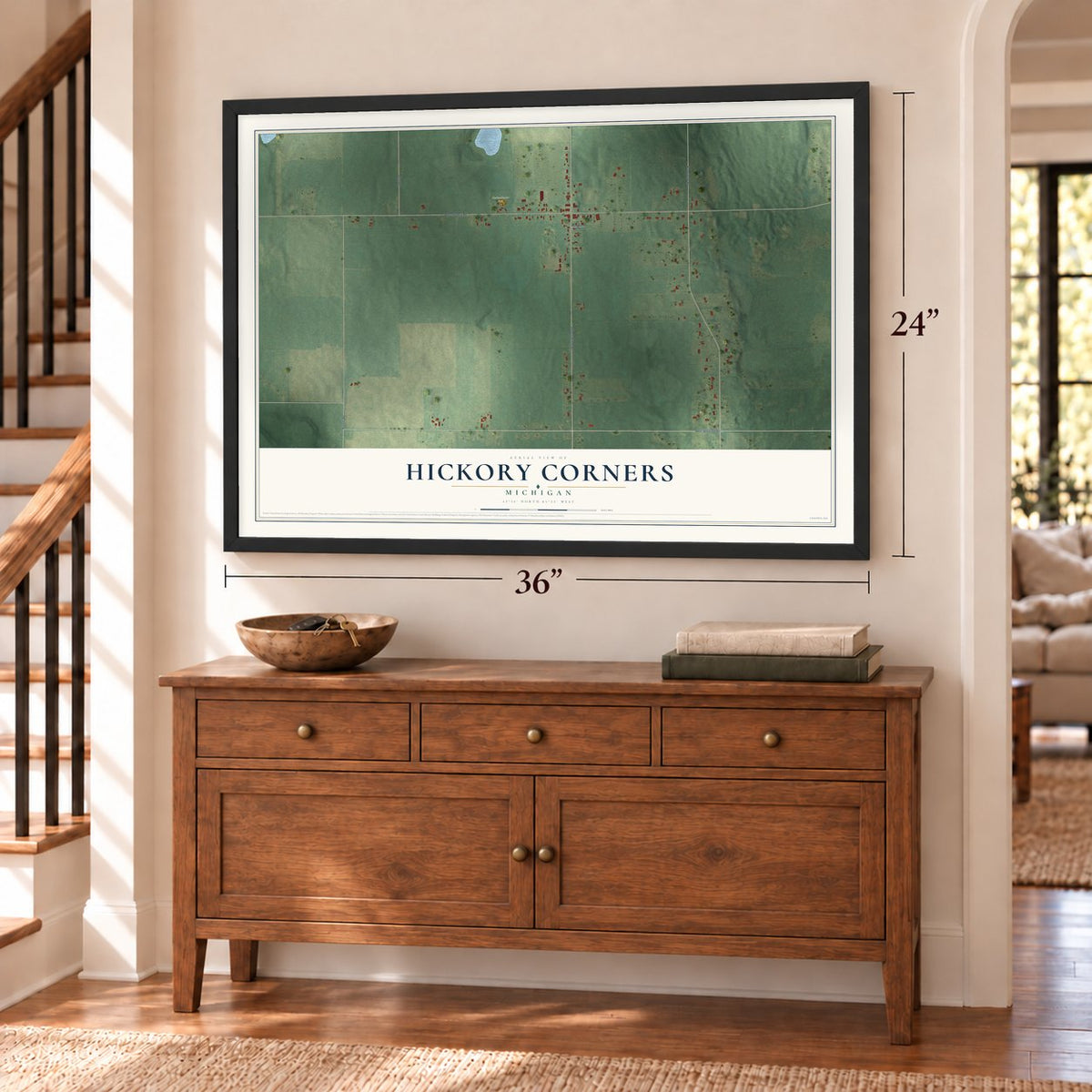 Hickory Corners, Michigan map, 24 x 36 inch print in a black frame above a dresser by a staircase