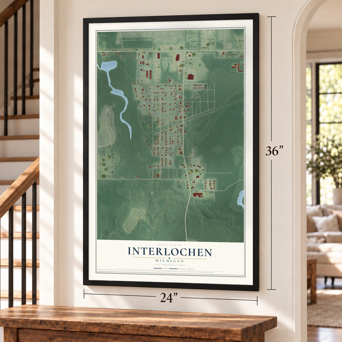 Interlochen, Michigan map, 24 x 36 inch print in a black frame by a staircase