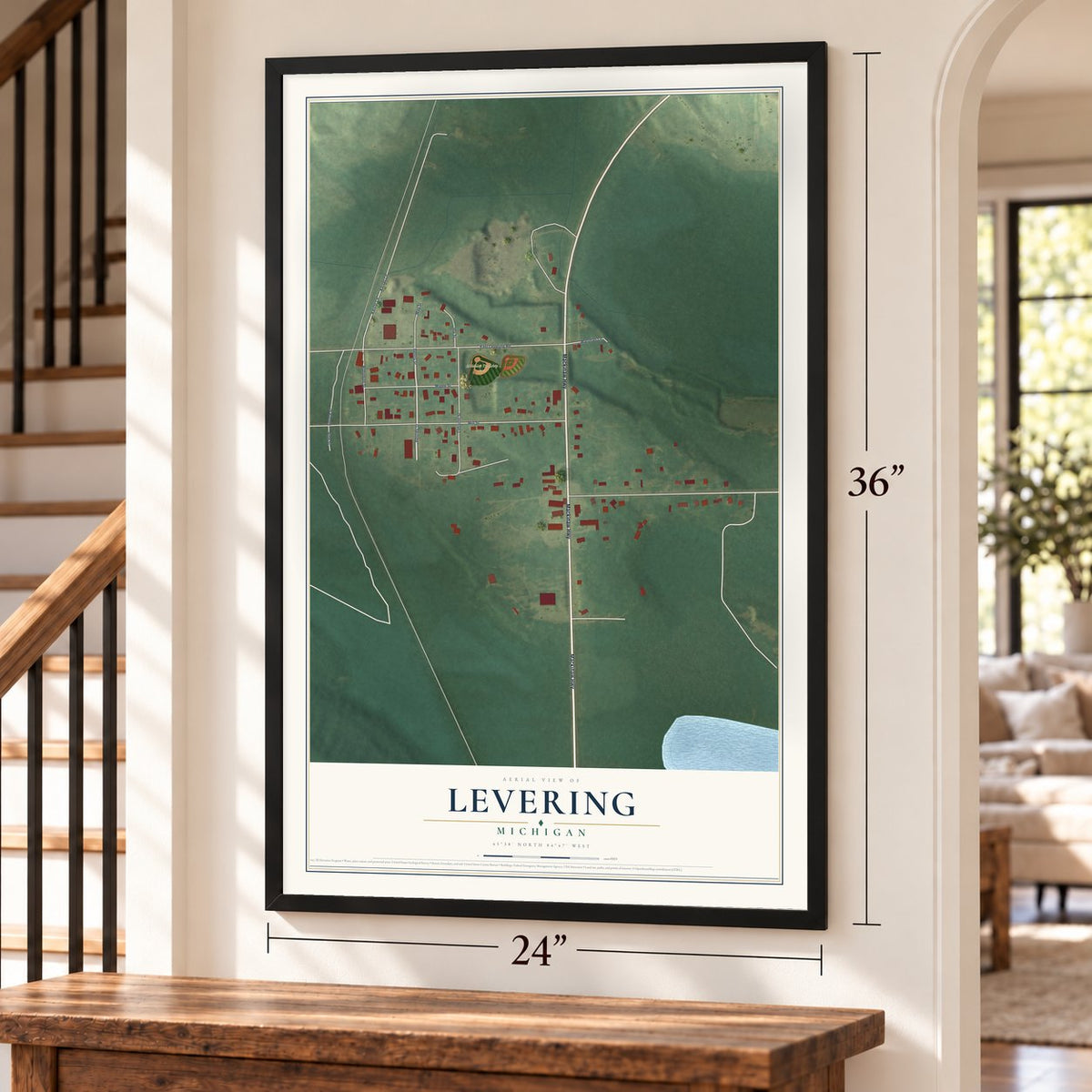Levering, Michigan map, 24 x 36 inch print in a black frame by a staircase