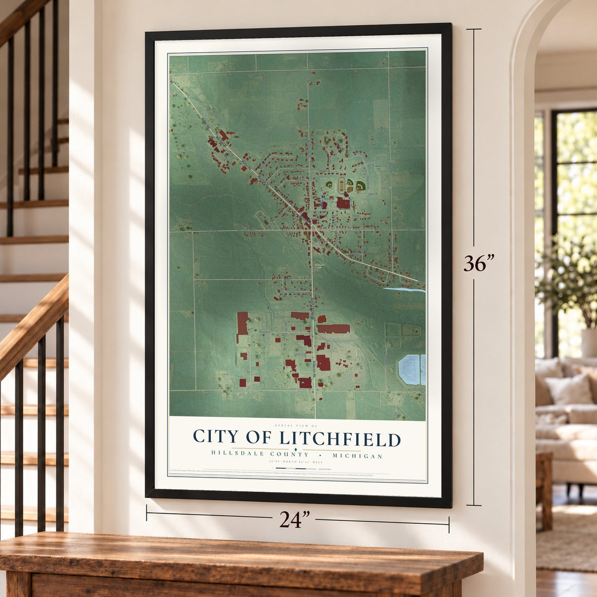 Litchfield, Michigan map, 24 x 36 inch print in a black frame by a staircase