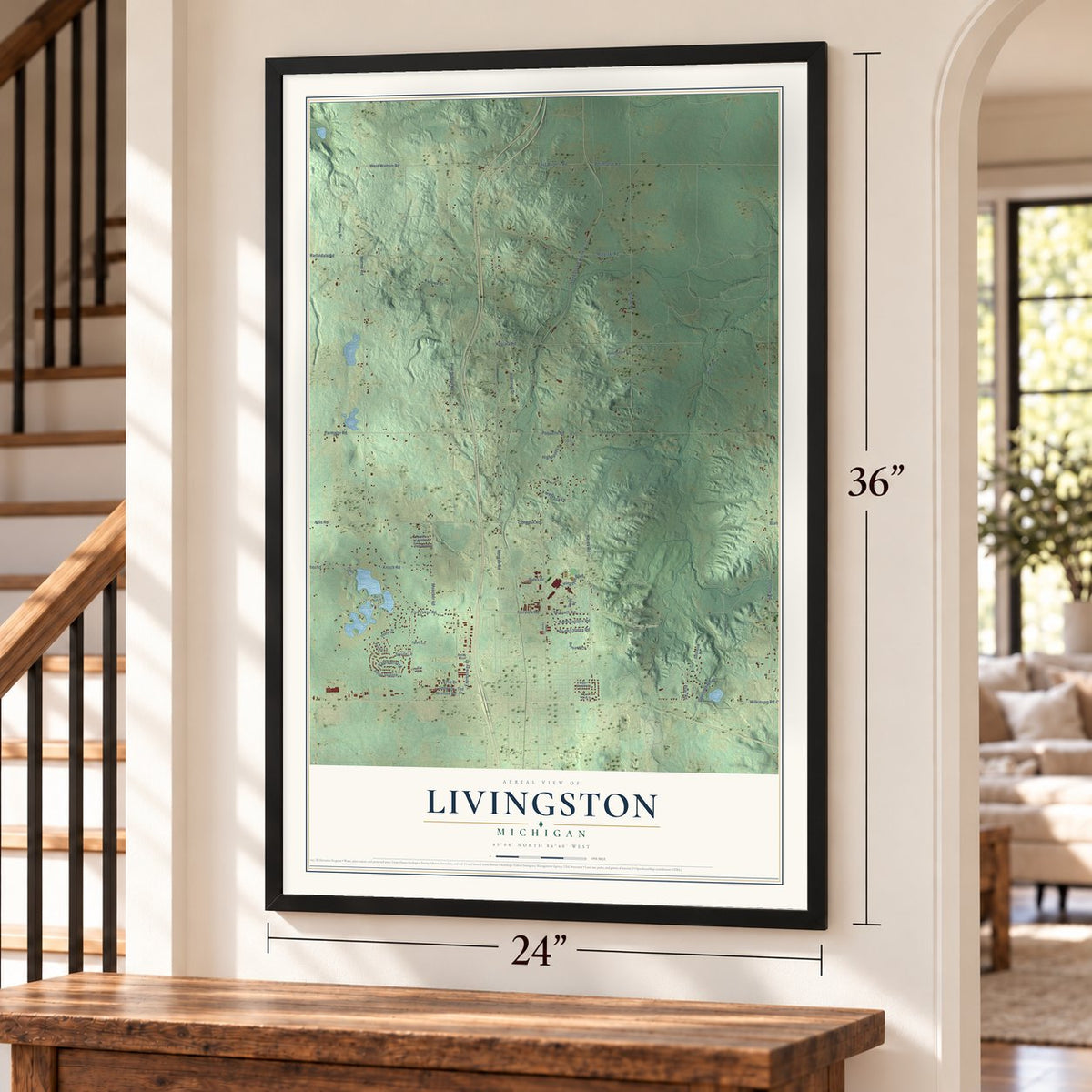 Livingston, Michigan map, 24 x 36 inch print in a black frame by a staircase