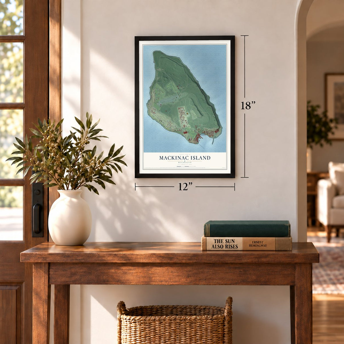 Mackinac Island, Michigan map, 12 x 18 inch print in a black frame in an entryway