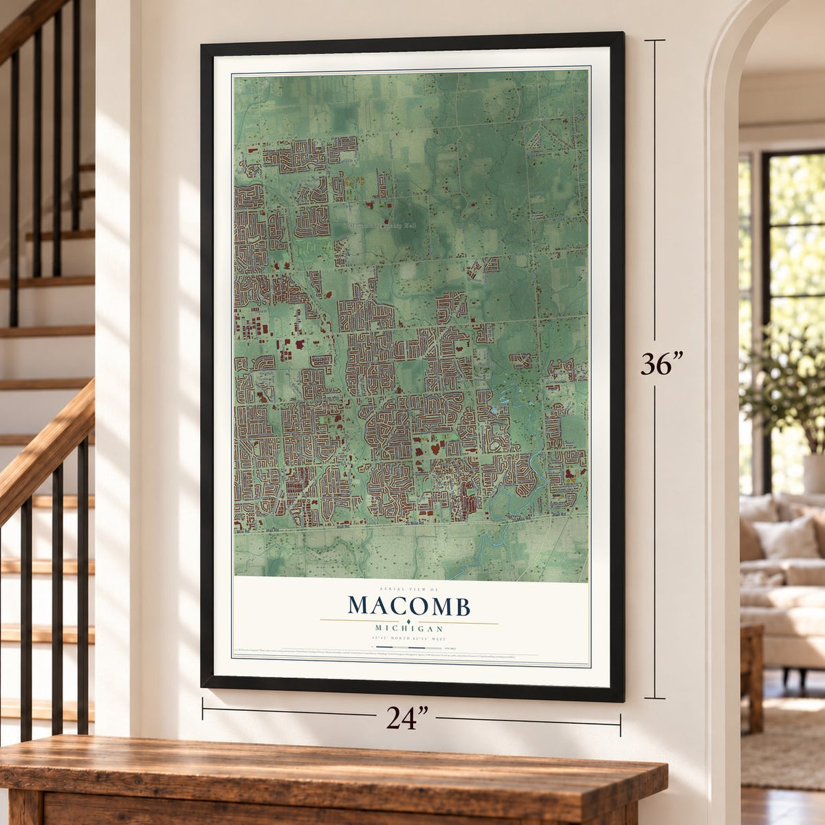 Macomb, Michigan map, 24 x 36 inch print in a black frame by a staircase