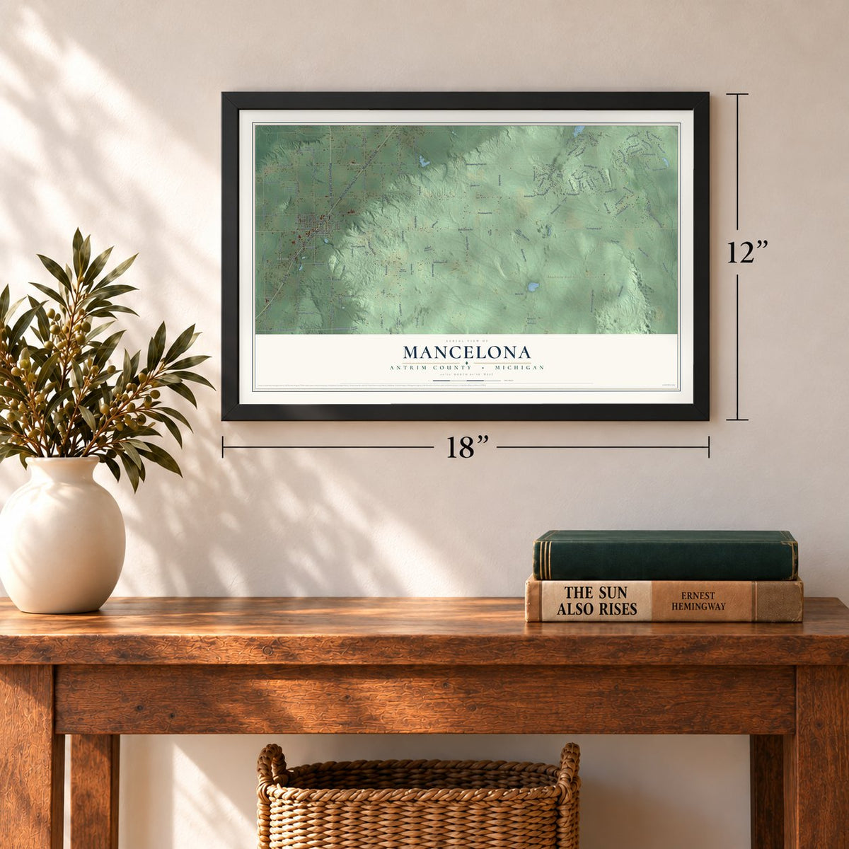 Mancelona, Antrim County, Michigan map, 12 x 18 inch print in a black frame in an entryway