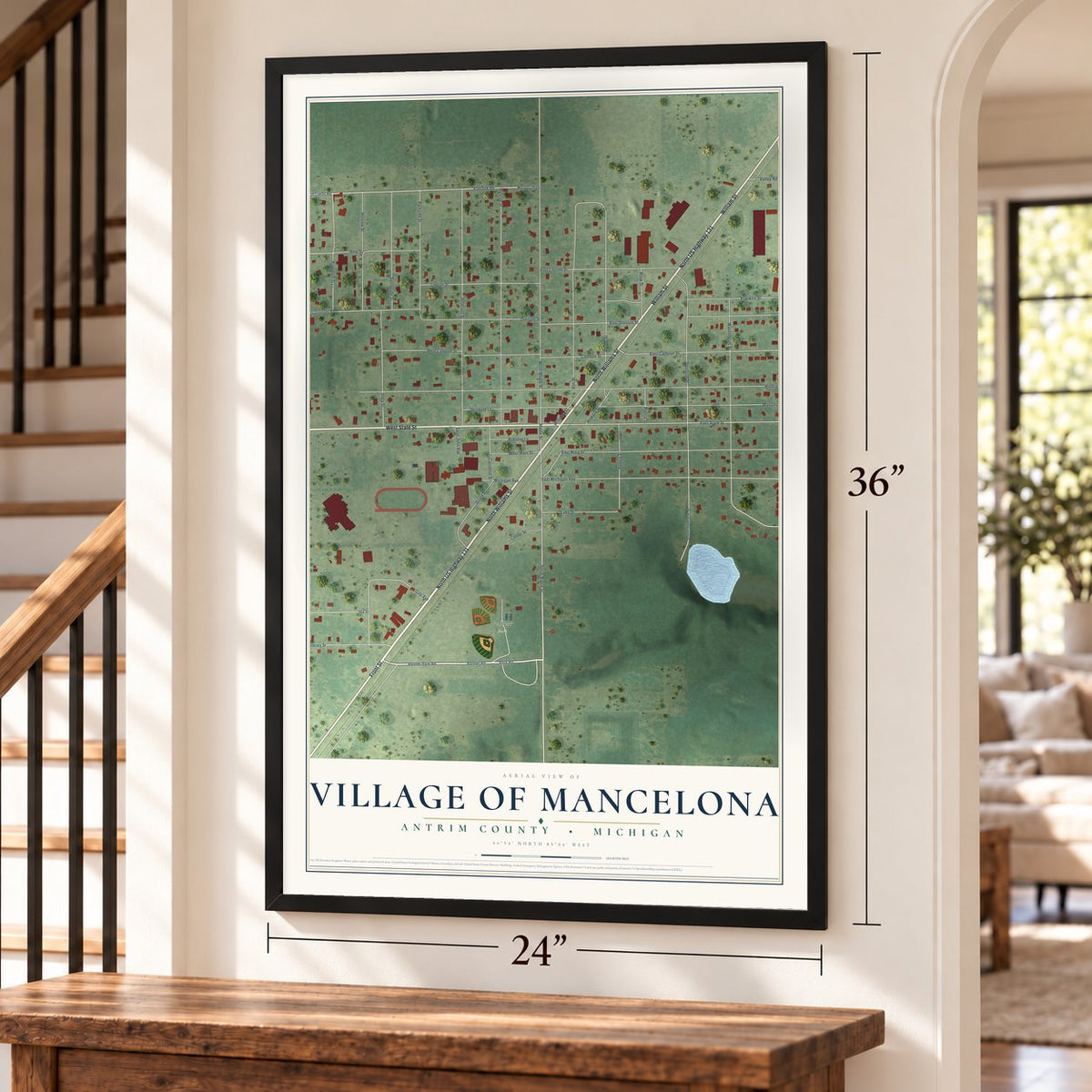 Mancelona, Michigan map, 24 x 36 inch print in a black frame by a staircase