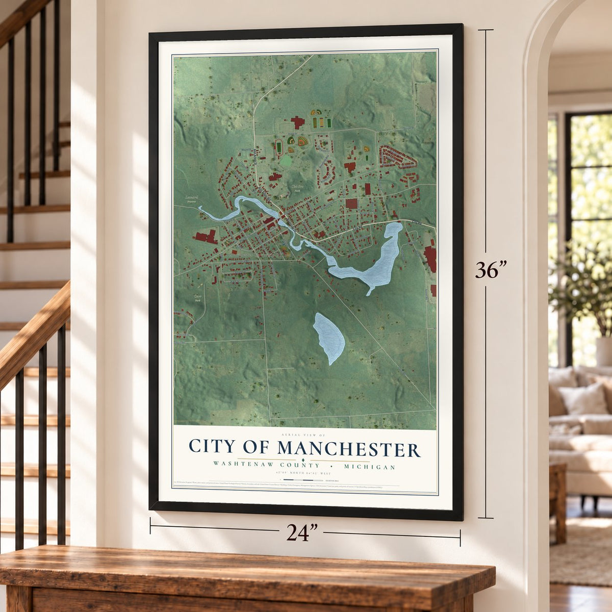 Manchester, Michigan map, 24 x 36 inch print in a black frame by a staircase