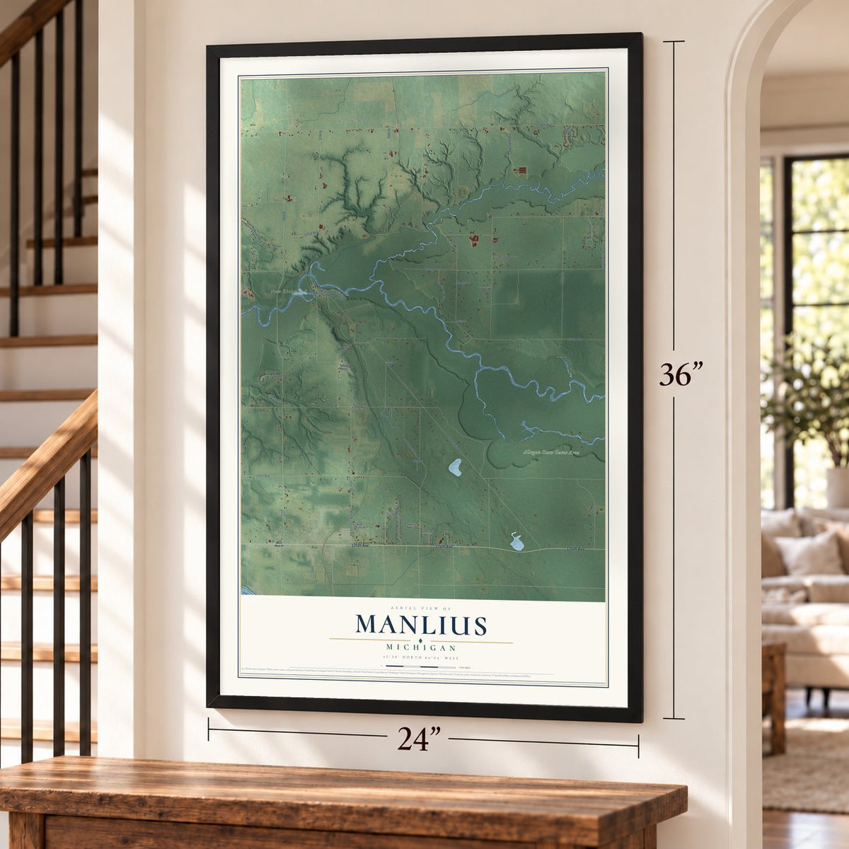 Manlius, Michigan map, 24 x 36 inch print in a black frame by a staircase