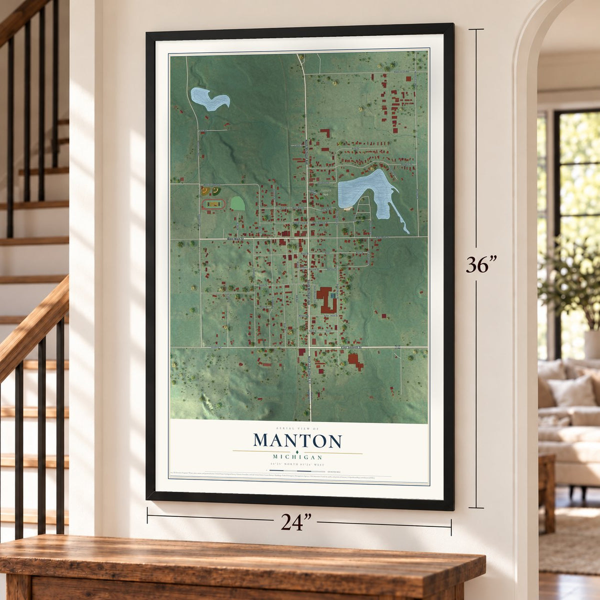 Manton, Michigan map, 24 x 36 inch print in a black frame by a staircase