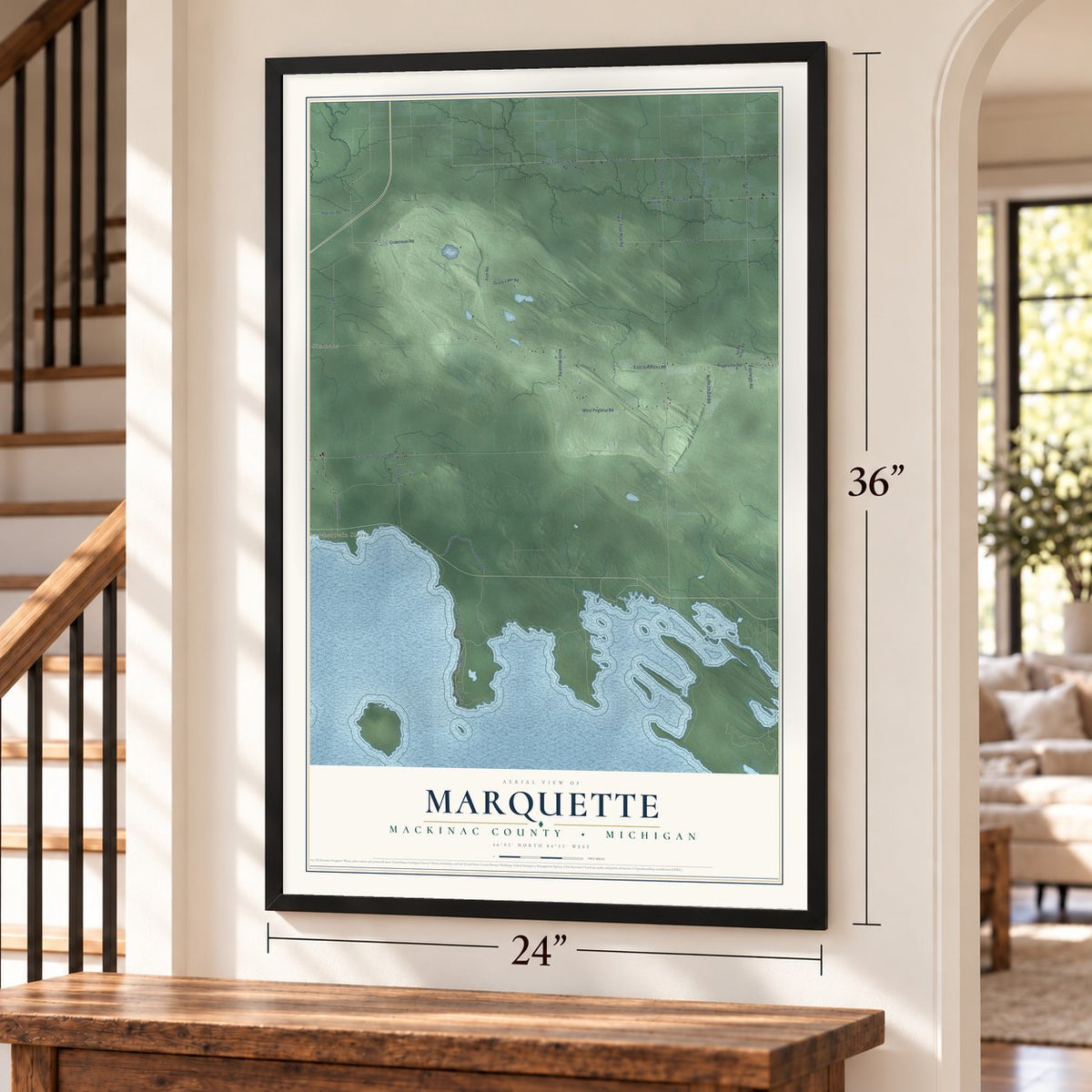 Marquette, Mackinac County, Michigan map, 24 x 36 inch print in a black frame by a staircase