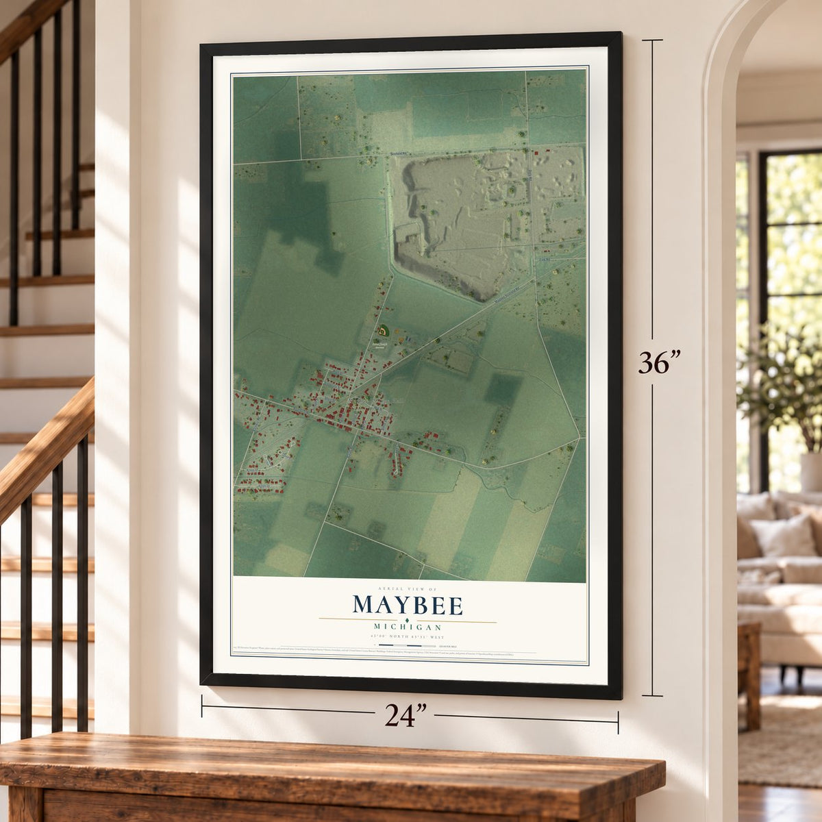Maybee, Michigan map, 24 x 36 inch print in a black frame by a staircase