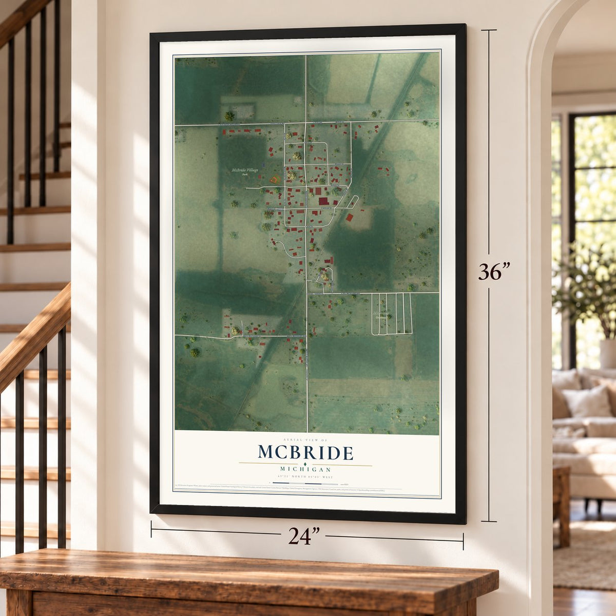 McBride, Michigan map, 24 x 36 inch print in a black frame by a staircase