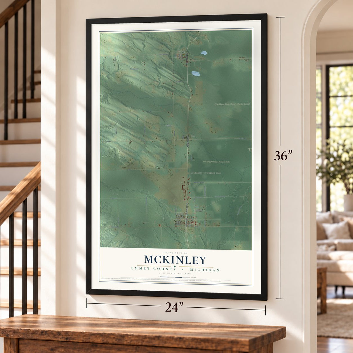 McKinley, Emmet County, Michigan map, 24 x 36 inch print in a black frame by a staircase