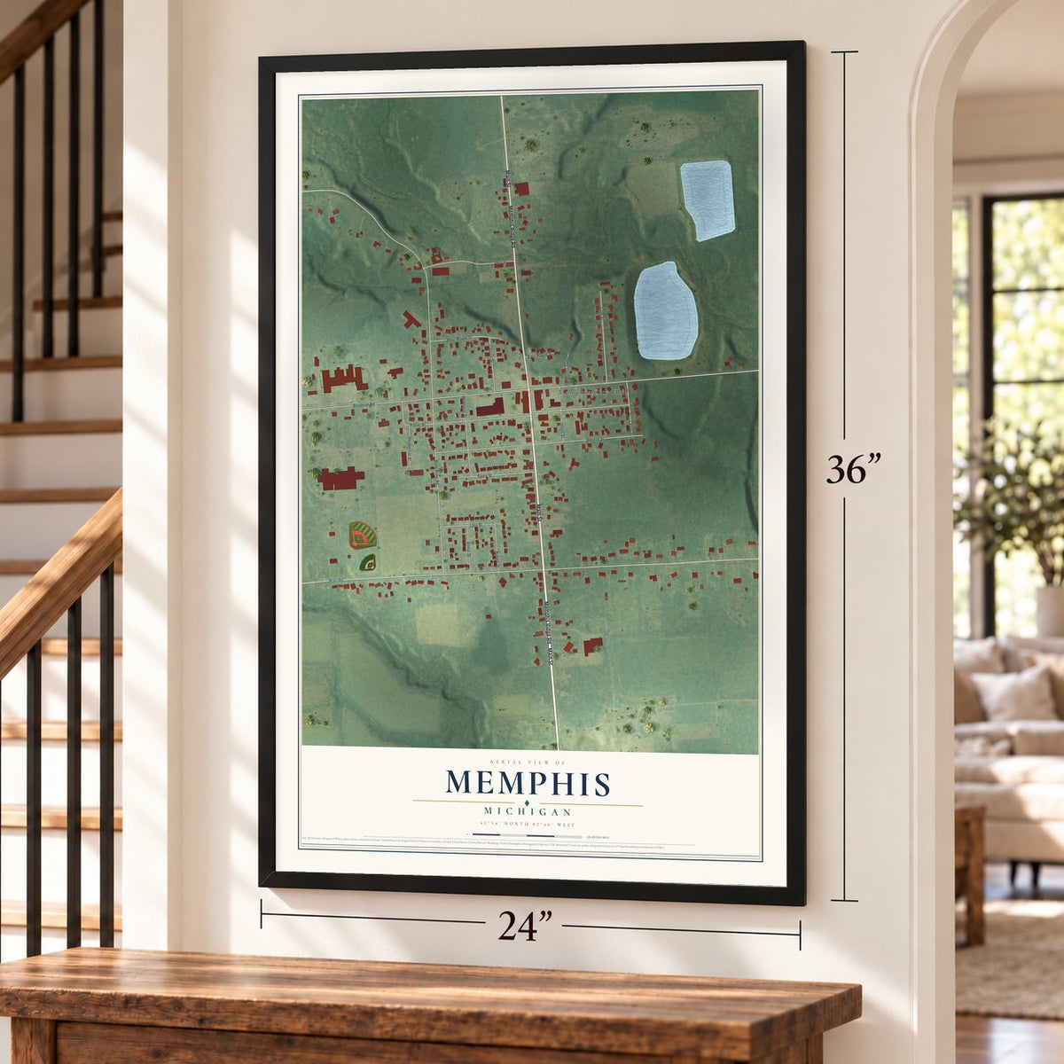 Memphis, Michigan map, 24 x 36 inch print in a black frame by a staircase