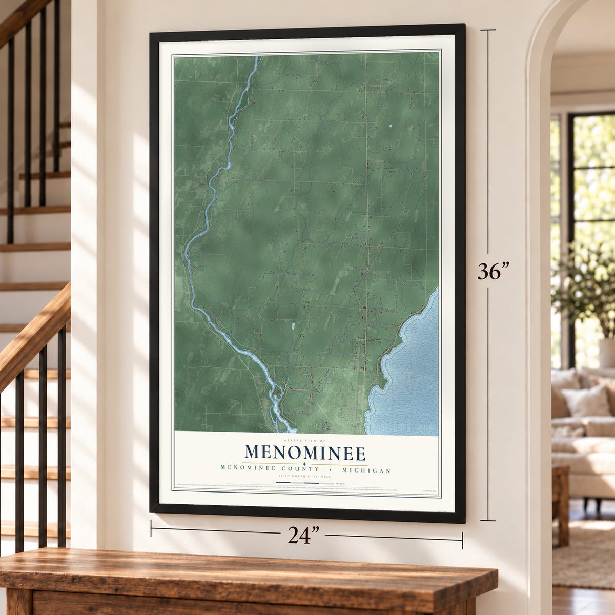 Menominee, Menominee County, Michigan map, 24 x 36 inch print in a black frame by a staircase