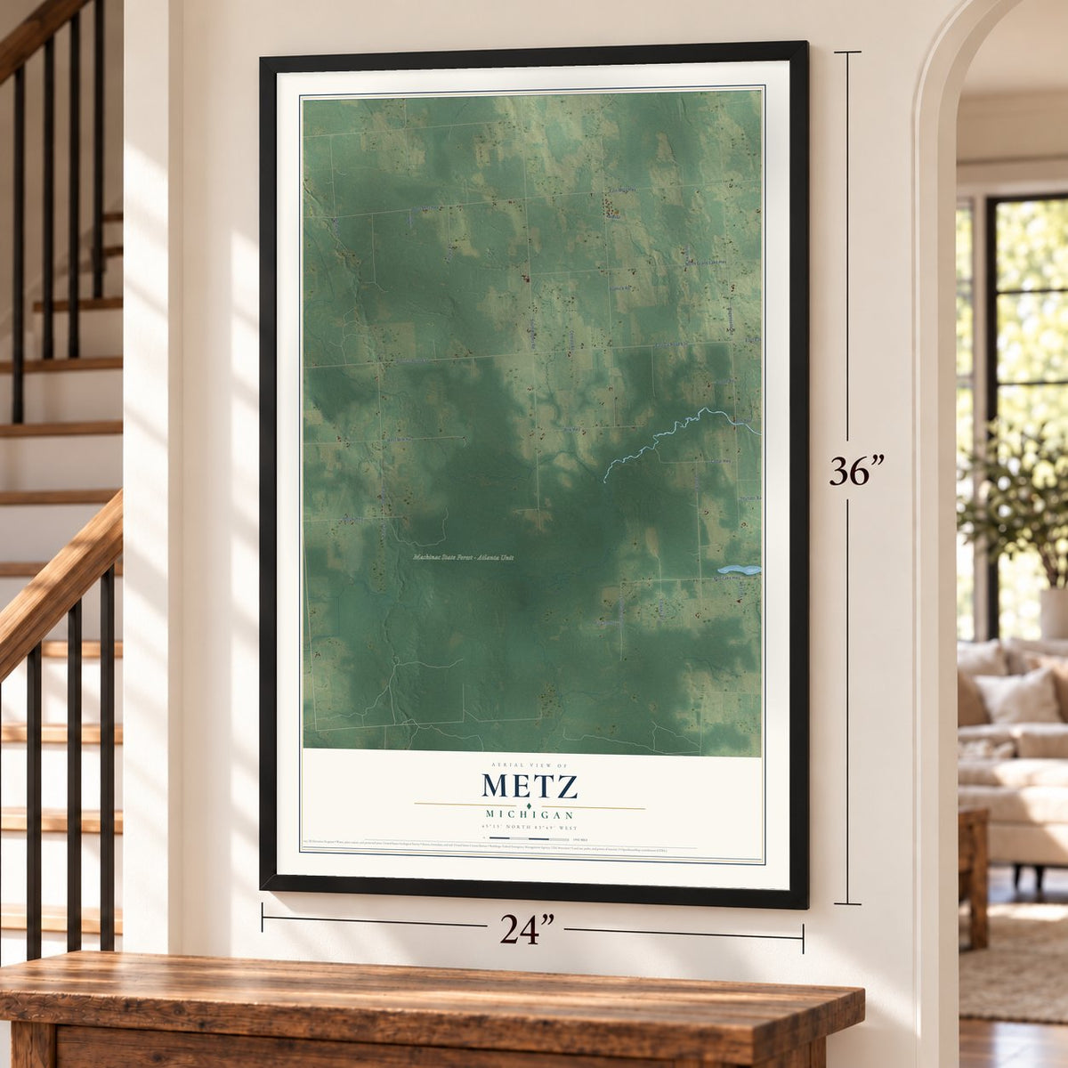 Metz, Michigan map, 24 x 36 inch print in a black frame by a staircase