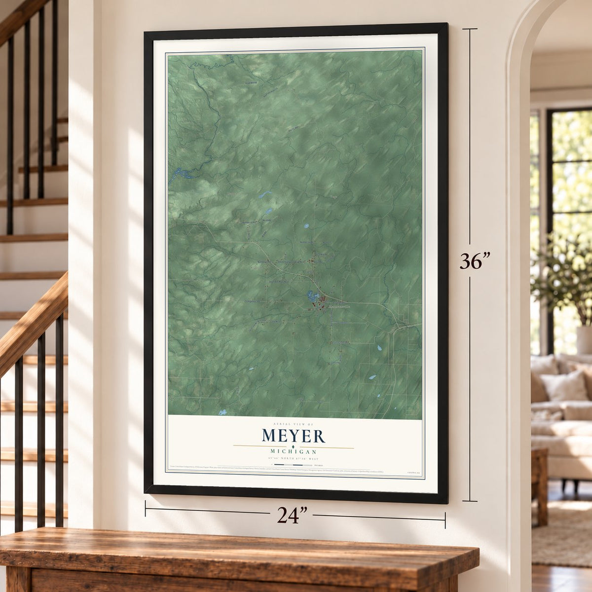 Meyer, Michigan map, 24 x 36 inch print in a black frame by a staircase