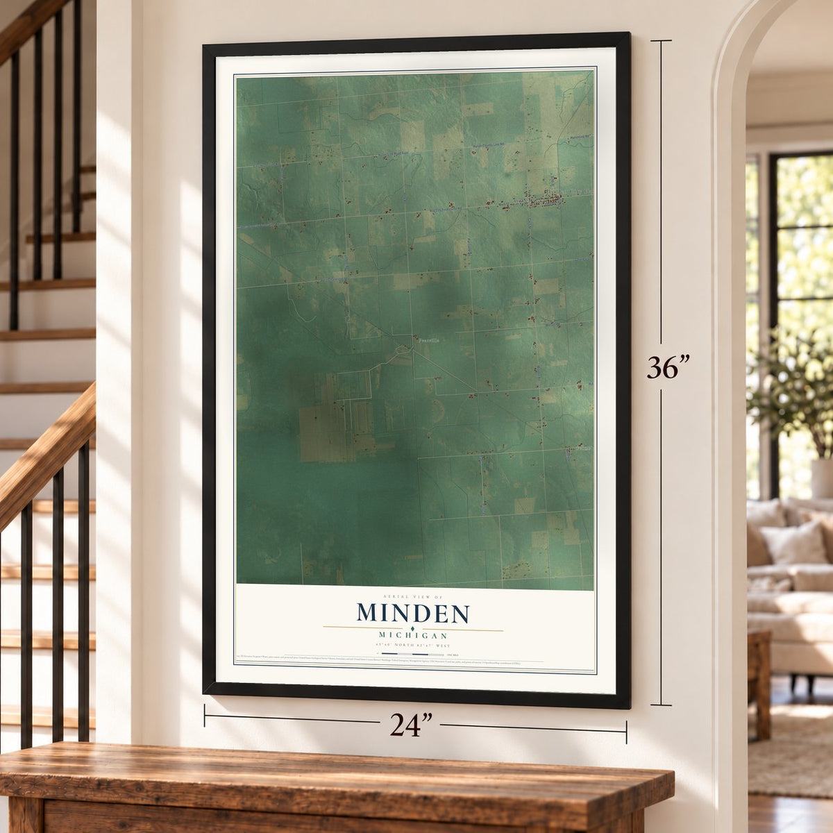 Minden, Michigan map, 24 x 36 inch print in a black frame by a staircase