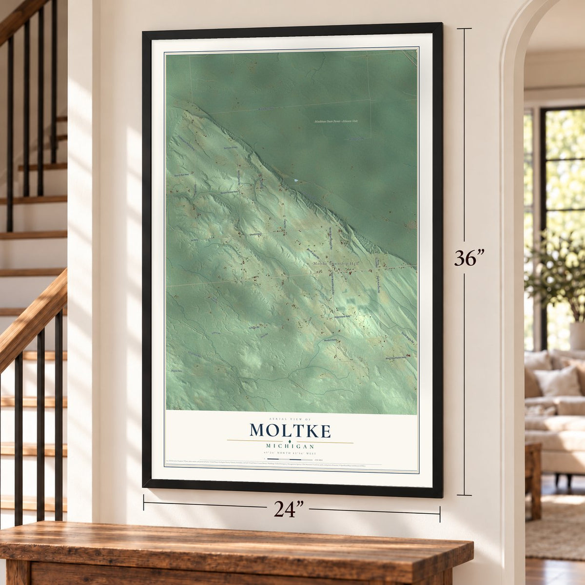 Moltke, Michigan map, 24 x 36 inch print in a black frame by a staircase