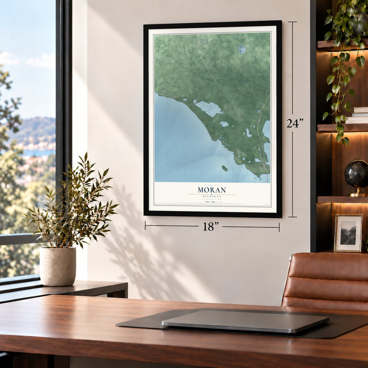 Moran, Michigan map, 18 x 24 inch print in a black frame in a home office
