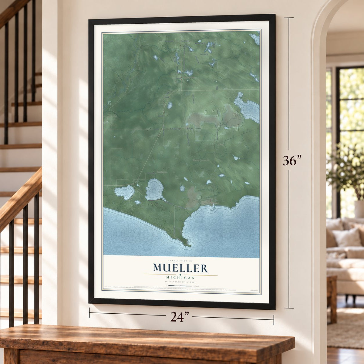 Mueller, Michigan map, 24 x 36 inch print in a black frame by a staircase