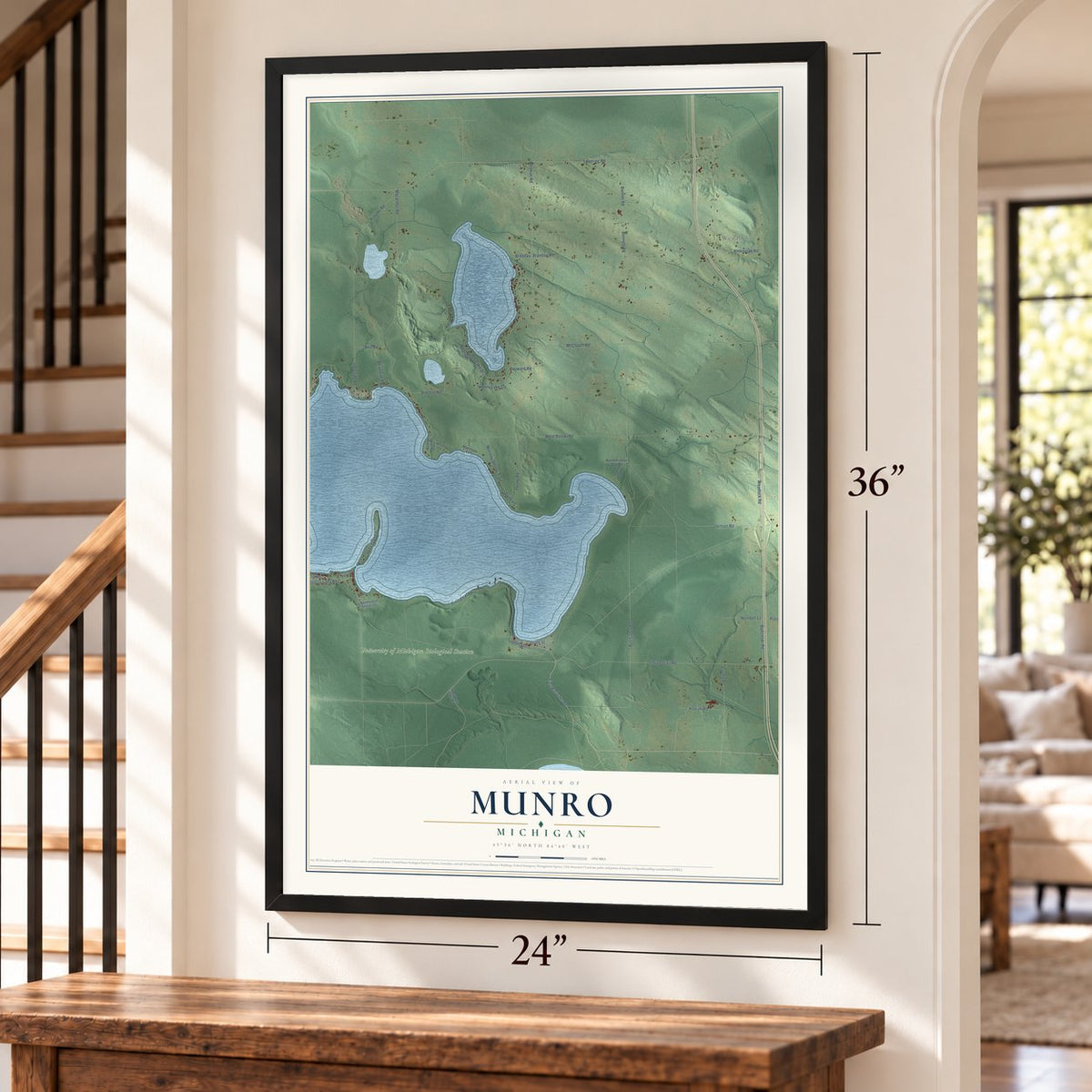 Munro, Michigan map, 24 x 36 inch print in a black frame by a staircase
