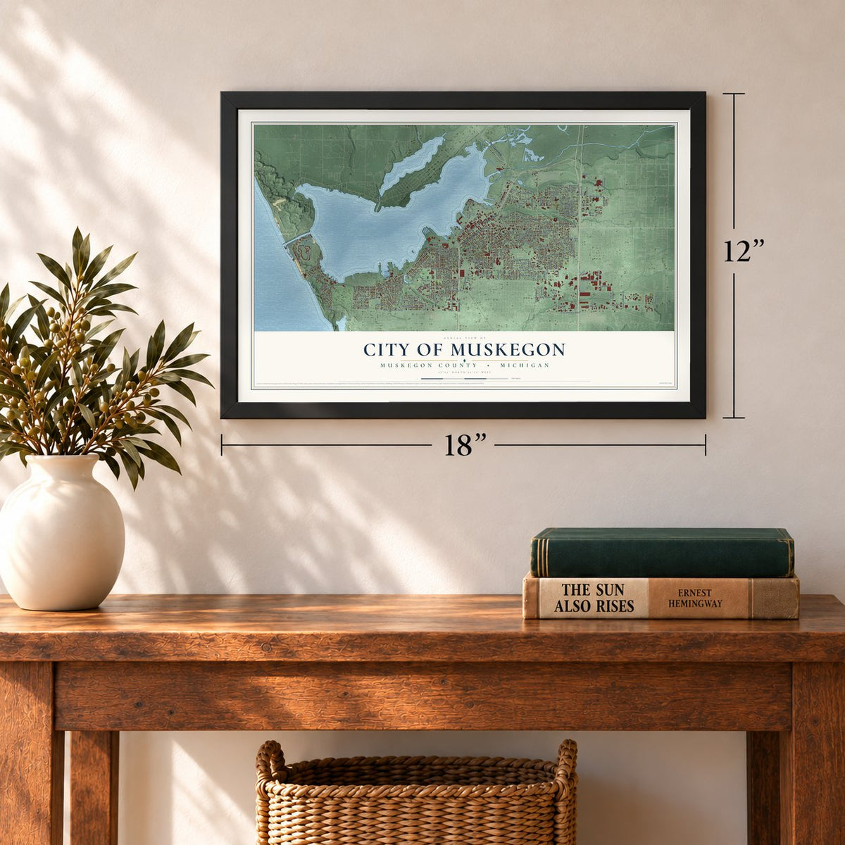 Muskegon, Michigan map, 12 x 18 inch print in a black frame in an entryway