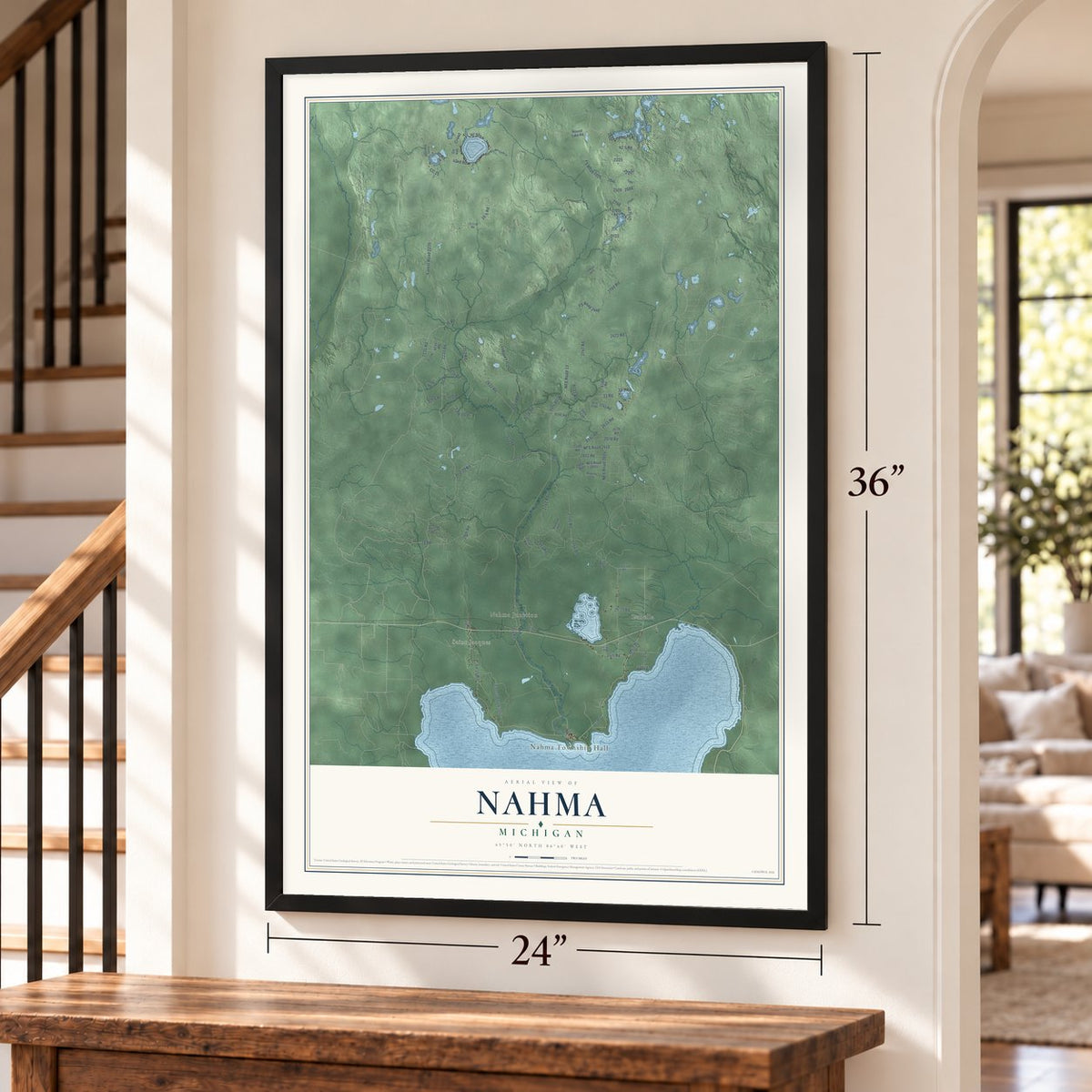 Nahma, Michigan map, 24 x 36 inch print in a black frame by a staircase