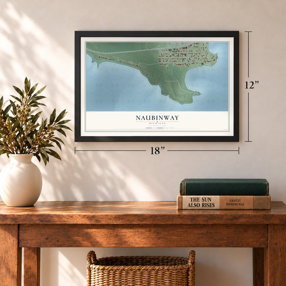 Naubinway, Michigan map, 12 x 18 inch print in a black frame in an entryway