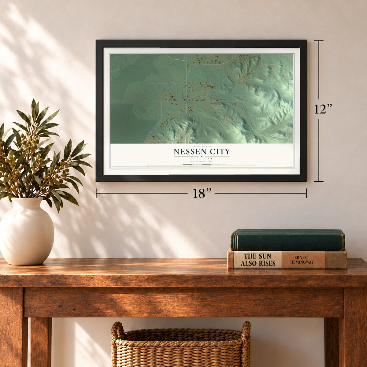 Nessen City, Michigan map, 12 x 18 inch print in a black frame in an entryway