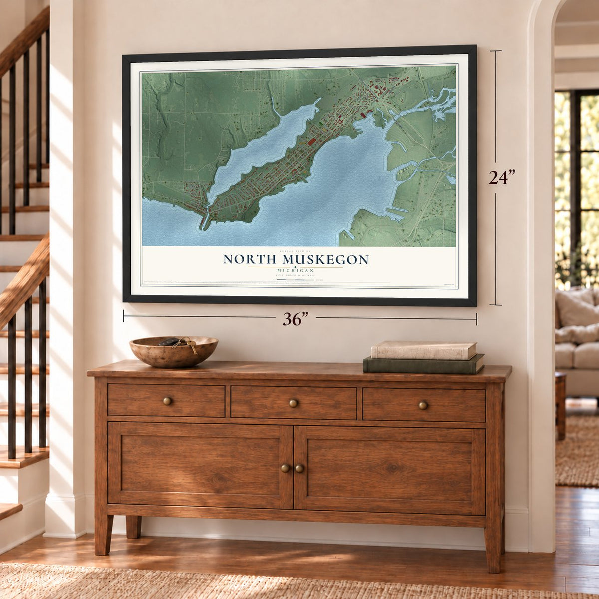 North Muskegon, Michigan map, 24 x 36 inch print in a black frame above a dresser by a staircase
