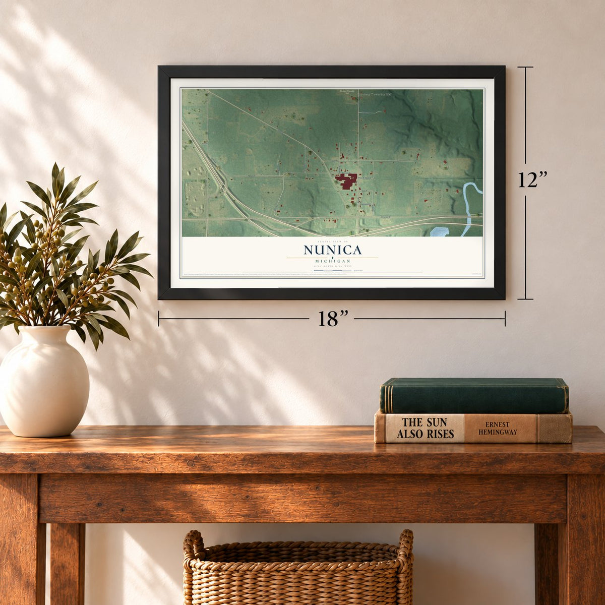 Nunica, Michigan map, 12 x 18 inch print in a black frame in an entryway