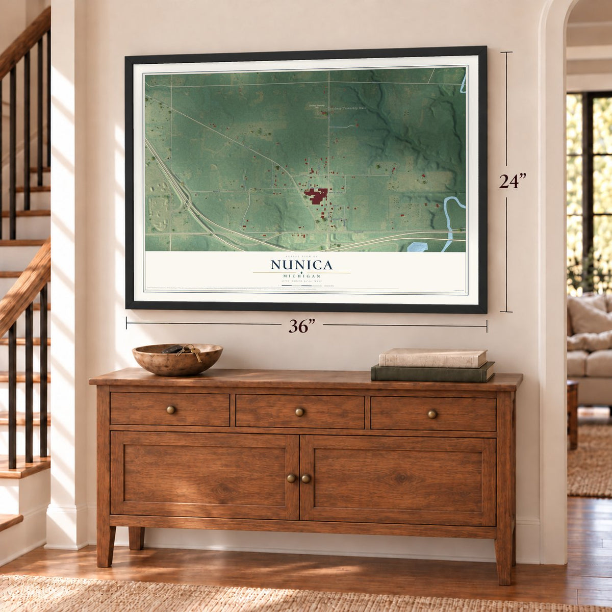 Nunica, Michigan map, 24 x 36 inch print in a black frame above a dresser by a staircase